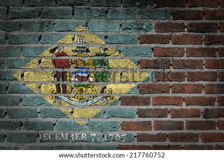 Dark brick wall texture - flag painted on wall - Delaware