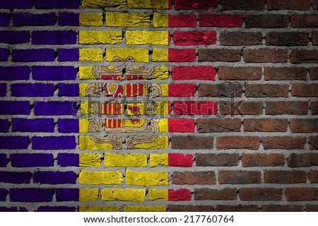 Dark brick wall texture - flag painted on wall - Andorra