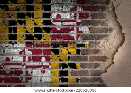 Dark brick wall texture with plaster - flag painted on wall - Maryland