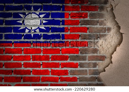 Dark brick wall texture with plaster - flag painted on wall - Taiwan