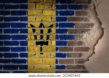 Dark brick wall texture with plaster - flag painted on wall - Barbados