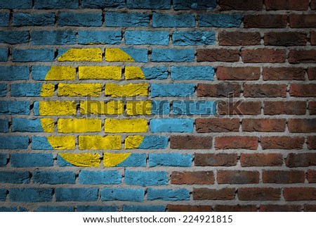 Very old dark red brick wall texture with flag - Palau