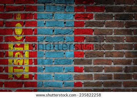 Very old dark red brick wall texture with flag - Mongolia