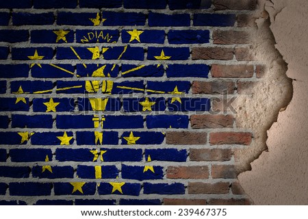 Dark brick wall texture with plaster - flag painted on wall - Indiana