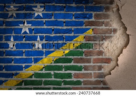 Dark brick wall texture with plaster - flag painted on wall - Solomon Islands