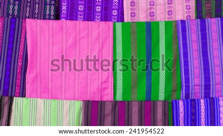 Silk scarfs on display in a silk factory in Vietnam
