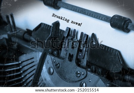 Close-up of an old typewriter with paper, perspective, selective focus, breaking news