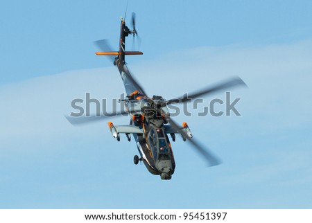 LEEUWARDEN,FRIESLAND,HOLLAND-SEPTEMBER 17:: Apache AH-64D Solo Display Team is flying an Airshow on September 17, 2011 at Leeuwarden Airfield, Friesland, Holland.