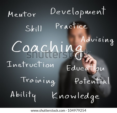 business man writing coaching concept