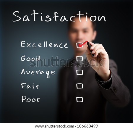 business man checking  excellence on customer satisfaction survey form