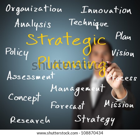 business man writing strategic planning concept