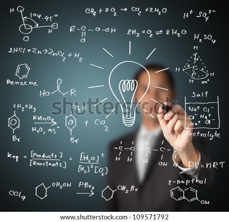 smart teacher writing various high school chemistry formula with light bulb ( symbol of idea and solution )
