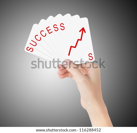 business hand hold cards of success