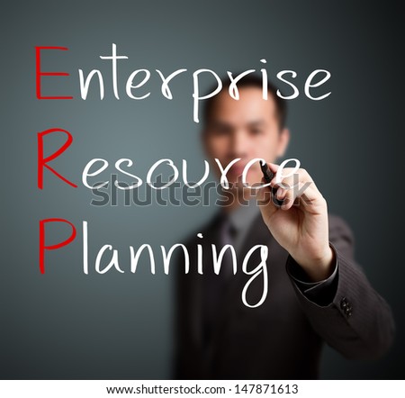 businessman writing enterprise resource planning (ERP) concept