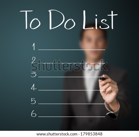 business man writing blank to do list