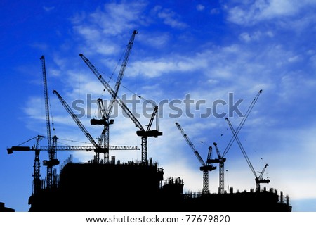 construction site silhouetted on daytime