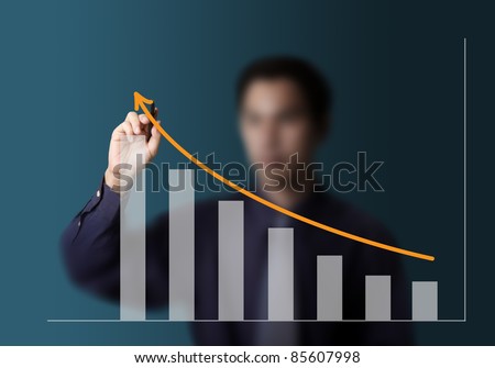 male hand drawing upward trend graph