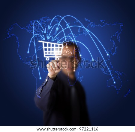 businessman pressing cart button on world map symbol of modern online marketing and shopping businessman pressing cart button on world map symbol of modern online marketing and shopping