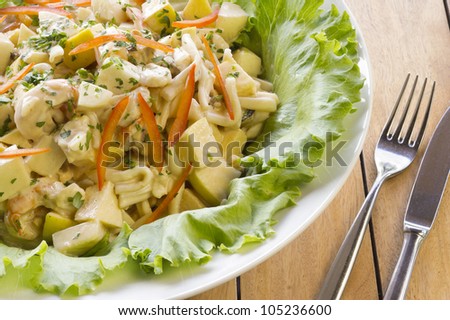 Fresh vegetable salad with potato, pasta, shrimps and red pepper