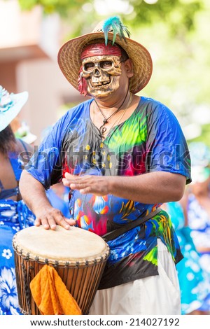 VICTORIA, SEYCHELLES  April 26, 2014: Local men in Death mask  at the Carnival International de Victoria in Seychelles