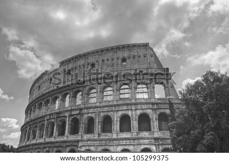 The black and white image of ancient Rome Coliseum. Italy.