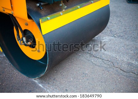 background of road rollers close-up during asphalt paving works