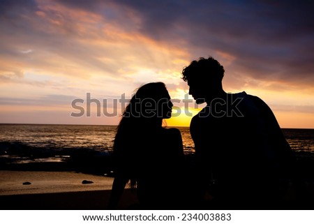 First date of a couple at background silhouette
