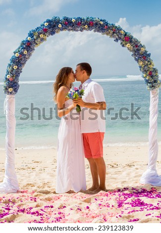 wedding couple near the ocean in Indonesia, Bali island