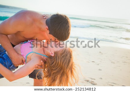 wedding couple just kissing at Balinese beach