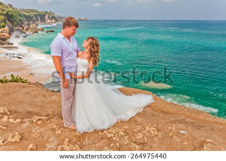wedding couple just married near the beach at Bali