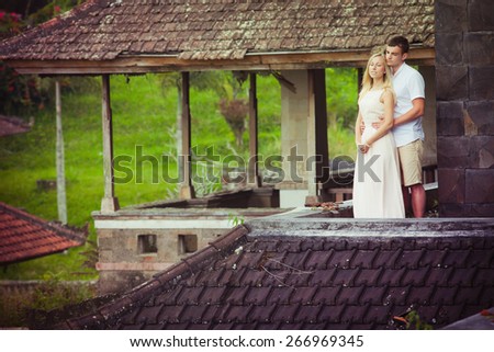 young couple at abandoned hotel in Bali - Taman Rekreasi Bedugul Hotel
