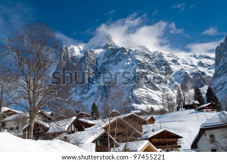 Several hotels near the Grindelwald ski area on the mountain. Switzerland. View of the mountain Schreckhorn