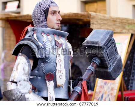 FLORENCE, ITALY - JULY 23: Unidentified cosplayer dressed as a fantasy warrior during the medieval and cosplay festival called \