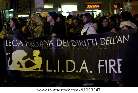 FLORENCE, ITALY - NOVEMBER 27: Animal right demonstration with banner of L.I.D.A. against the company policy of fast-food chain McDonald\'s on November 27, 2011 in Florence (Italy)