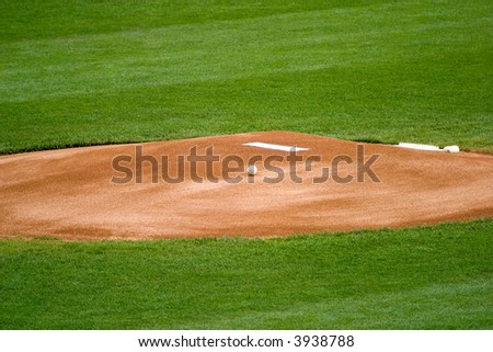 A baseball on a pitchers mound