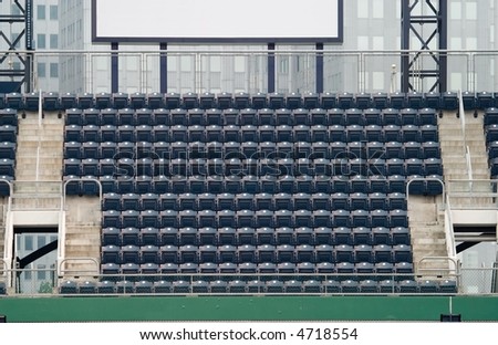 Empty outfield seats at a sports arena.