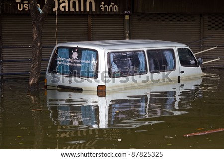 BANGKOK, THAILAND - OCTOBER 30 : Car swamping in flood water on October 30,2011  Bangkok, Thailand.