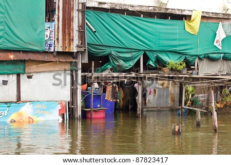 BANGKOK THAILAND - OCTOBER 29 : Flooded house during the monsoon season on October 29, 2011 at Tha Tien Bangkok, Thailand.