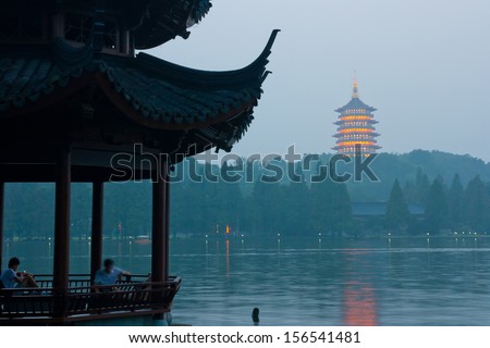 HANGZHOU, CHINA - SEP 15: Tourists in West Lake on Sep 15, 2013 in hangzhou, West lake is one of China's ten major places of historic interest and scenic beauty,world cultural heritage