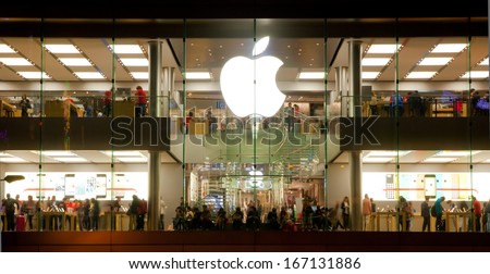 HONG KONG, CHINA - DEC 9: Apple store on December 9, 2013 in Hong Kong, China. It is the world largest publicly traded company designs and sells consumer electronics and computer products.