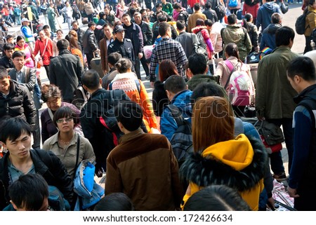 GUANGZHOU, CHINA - JANUARY 20:  Thousands Chinese people leaving city return home for Chinese New Year on January 20, 2014,Guangzhou Railway serves 200000 passengers per day.