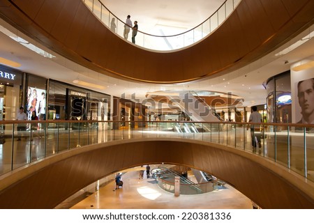 GUANGZHOU, CHINA  - SEP 29: TaiKoo Hui is a major International level luxurious shopping centre on Sep 29, 2014 in Guangzhou. Designed by world-renowned architectural firm Arquitectonica.
