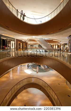 GUANGZHOU, CHINA  - SEP 29: TaiKoo Hui is a major International level luxurious shopping centre on Sep 29, 2014 in Guangzhou. Designed by world-renowned architectural firm Arquitectonica.