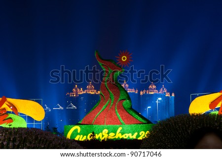 GUANGZHOU, CHINA - NOVEMBER 12: The asian games mascot is displayed in colorful lights during the opening ceremony of 2010 Asian Games on November 12, 2010 in Guangzhou, China.
