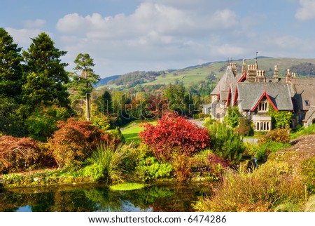 A large English coutry house and garden in rich Autumn colours