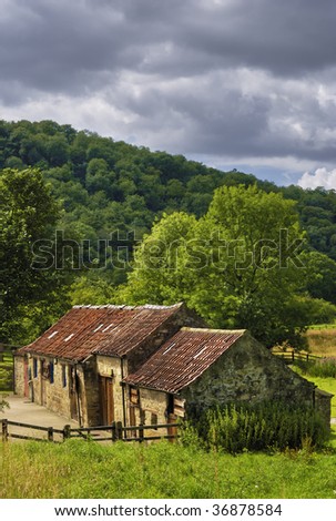 Exterior view of farm stable block in countryside, Rievaulx village, North Yorkshire Moors National Park, England.