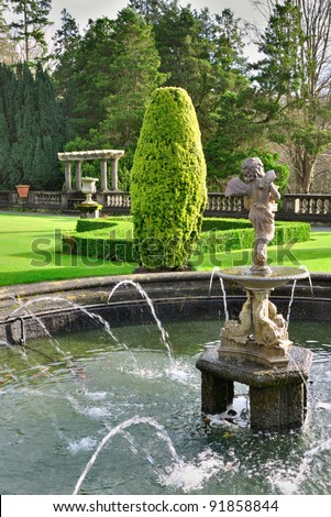 The fountain and balustrade in the formal English garden at Rydal Hall in the English Lake District, Cumbria, England