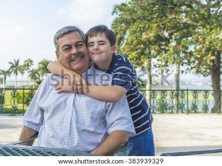portrait of father with with teenage son