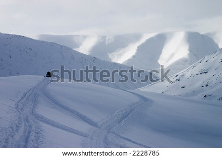 Snowmobile at top of mountain