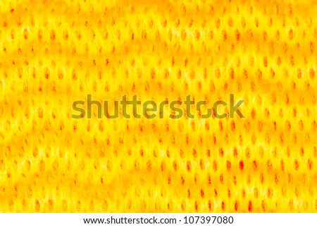 Very interesting yellow wave pattern on perforated cloth. Cool background.